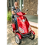 Man sitting on the Luxury Seventy-Two in Red Man sitting on the Luxury Seventy-Two in Red
