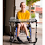 Boy sitting in a wheelchair outside with adaptive desk Boy sitting in a wheelchair outside with adaptive desk